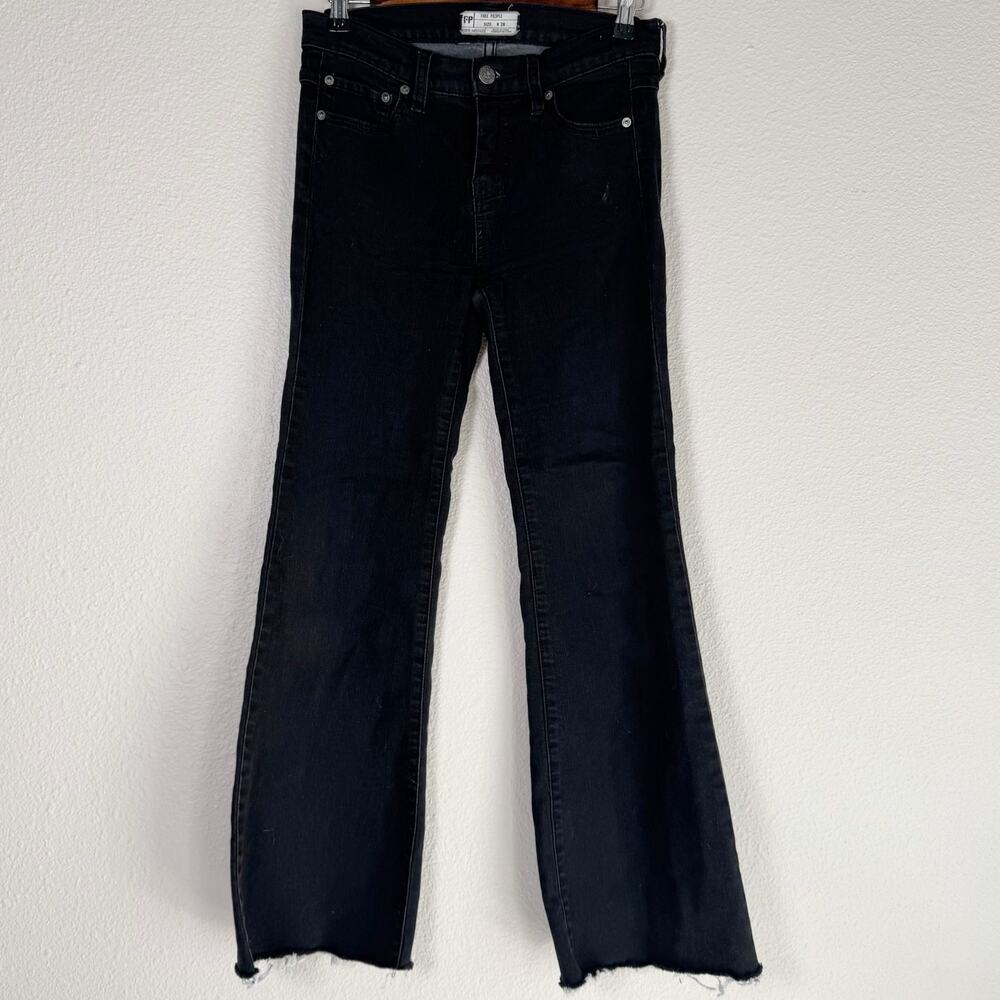 free people | black flare leg raw hem women’s jeans sz 26